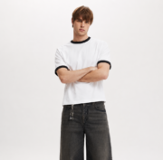 White ringer T-shirt featuring black contrast collar and sleeve cuffs, crafted from premium soft cotton for all-day comfort.