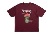 Burgundy oversized graphic T-shirt featuring a Strawberry Matcha drink print on the front with soft premium cotton fabric.
