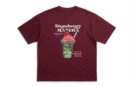 Burgundy oversized graphic T-shirt featuring a Strawberry Matcha drink print on the front with soft premium cotton fabric.