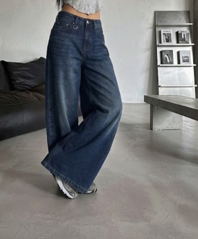 Dark blue high-waist wide leg denim jeans featuring a classic five-pocket design, premium denim fabric, and a relaxed modern fit.