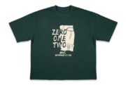 Dark green oversized graphic T-shirt featuring a "ZERO ONE TWO" front print with illustrated artwork and a soft cotton fabric.