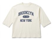 Off-white oversized long sleeve T-shirt featuring a Brooklyn New York graphic print on the front, crafted from soft premium cotton for everyday comfort.
