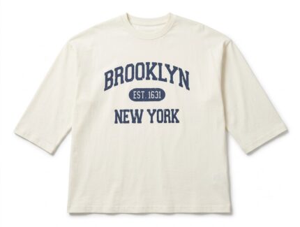Off-white oversized long sleeve T-shirt featuring a Brooklyn New York graphic print on the front, crafted from soft premium cotton for everyday comfort.